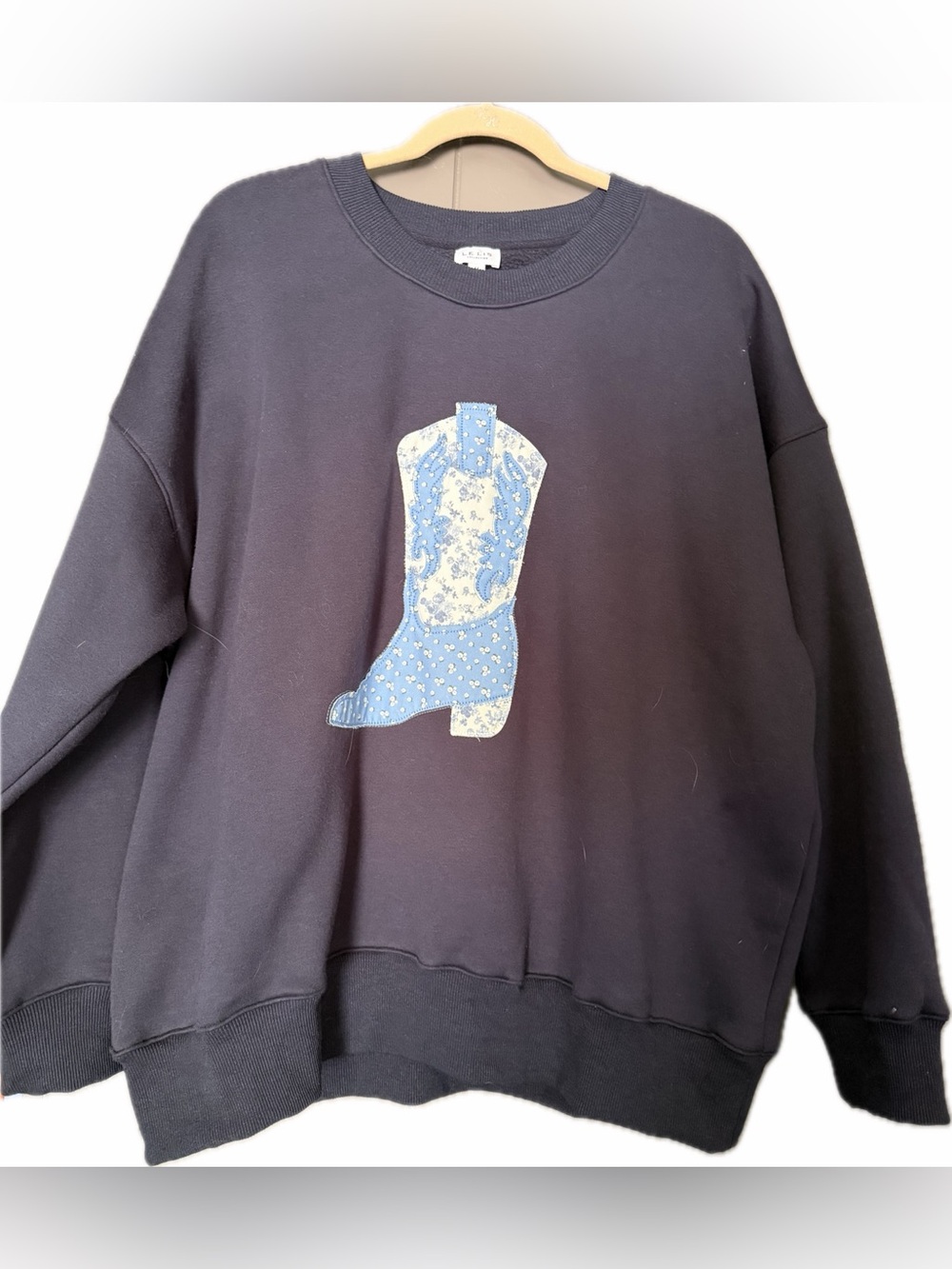 Le Lis Black Sweatshirt with Blue Cowboy Boot Appliqué